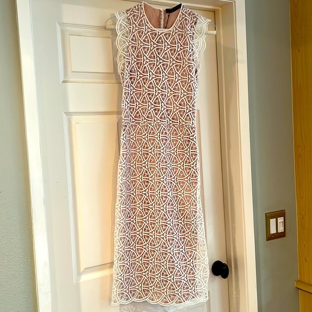 ZARA WOMAN brand new white lace dress with nude lining. Size XS fits 00 to 0